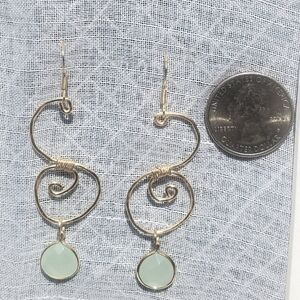 Artisan Gold Wire Dangle Earrings with a dangling  Peridot stone